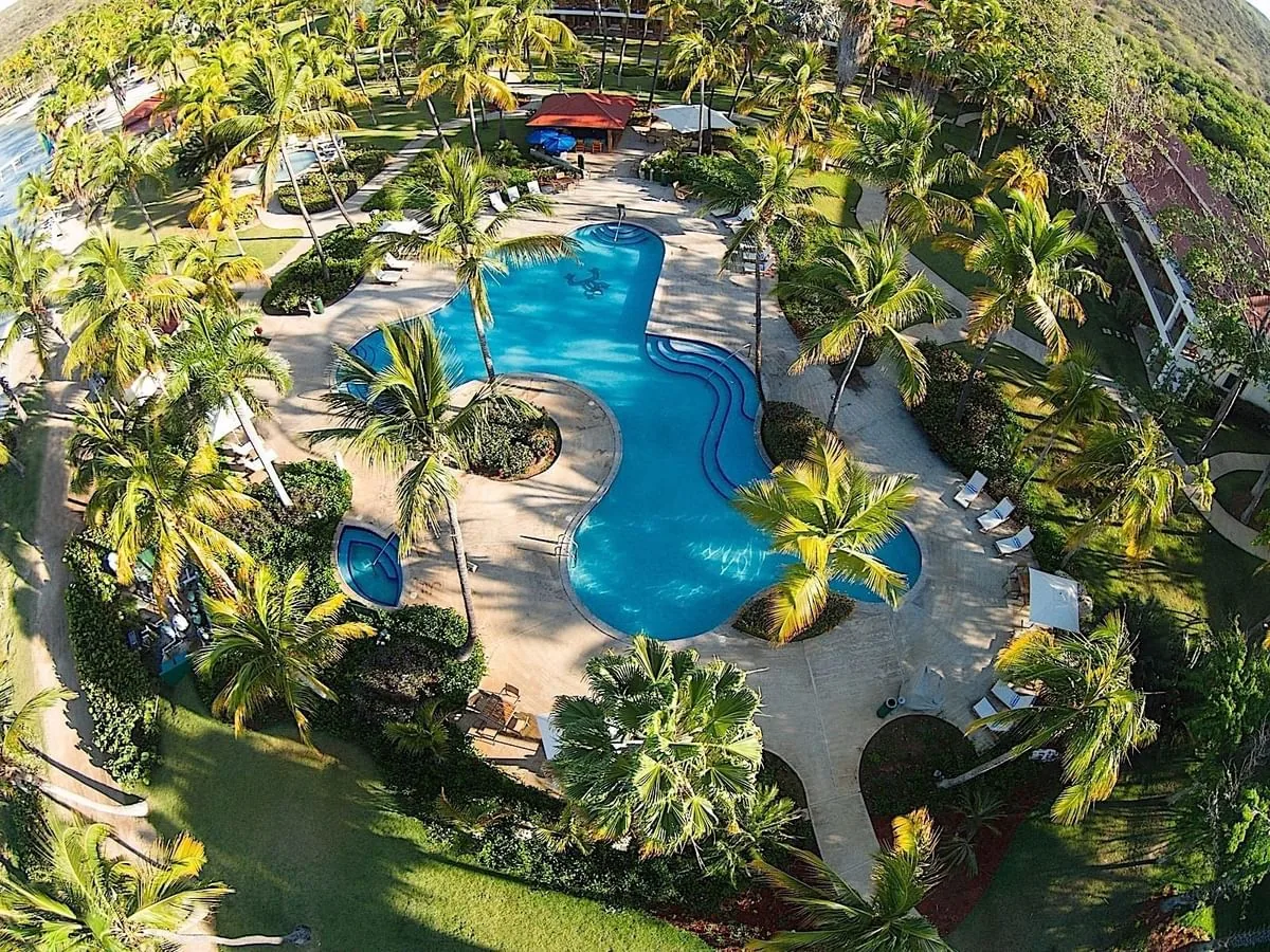 Swimming pool and tropical gardens at Copamarina Beach Resort & Spa
