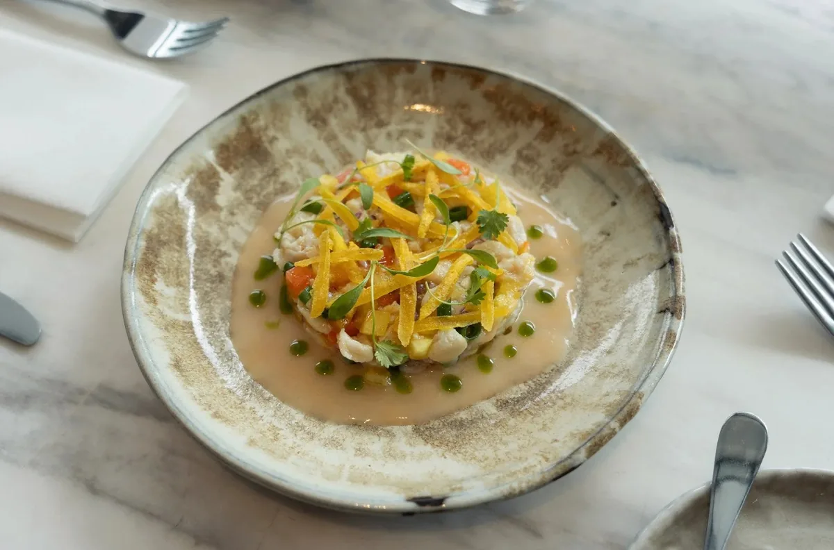 A plated dish with colorful vegetables at Vianda.