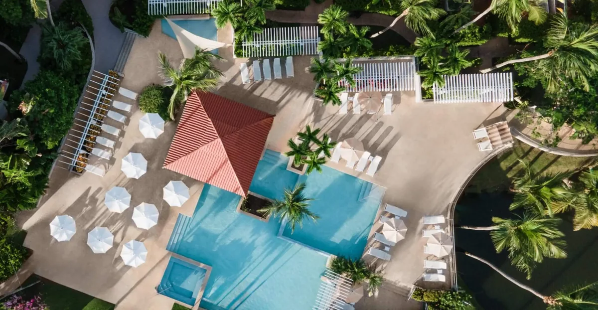 Aerial view of the pool and gardens at Wyndham Palmas Beach & Golf Boutique Resort